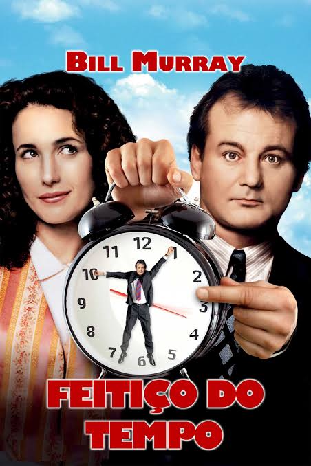 Capa do filme Feitiço do Tempo, com um homem e uma mulher ao lado de um grande relógio despertador, representando a repetição do tempo. O título “Feitiço do Tempo” aparece em destaque na parte inferio